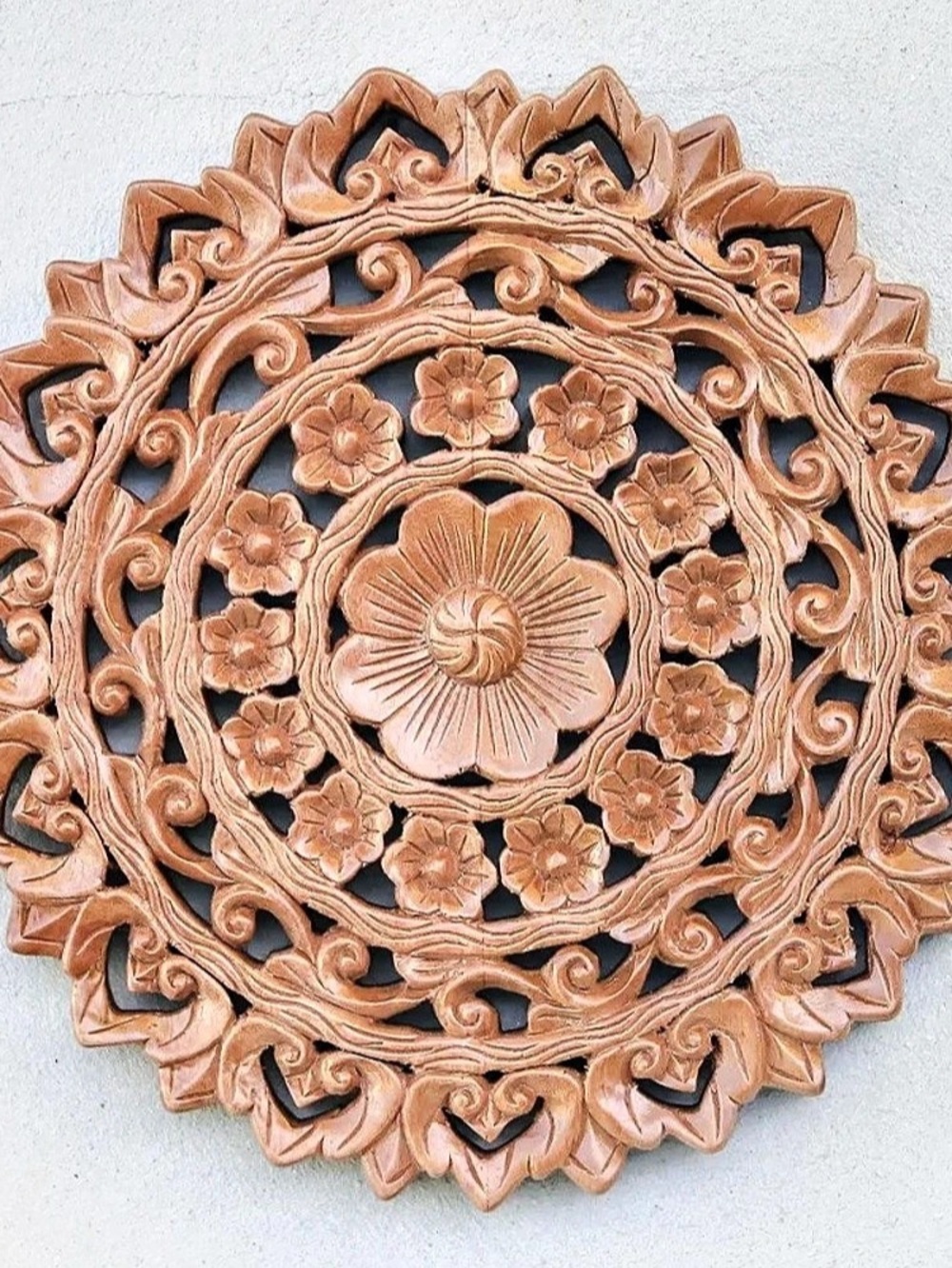 Novica Radiant Flowers Carved Floral Round Wall Decor in Brown
